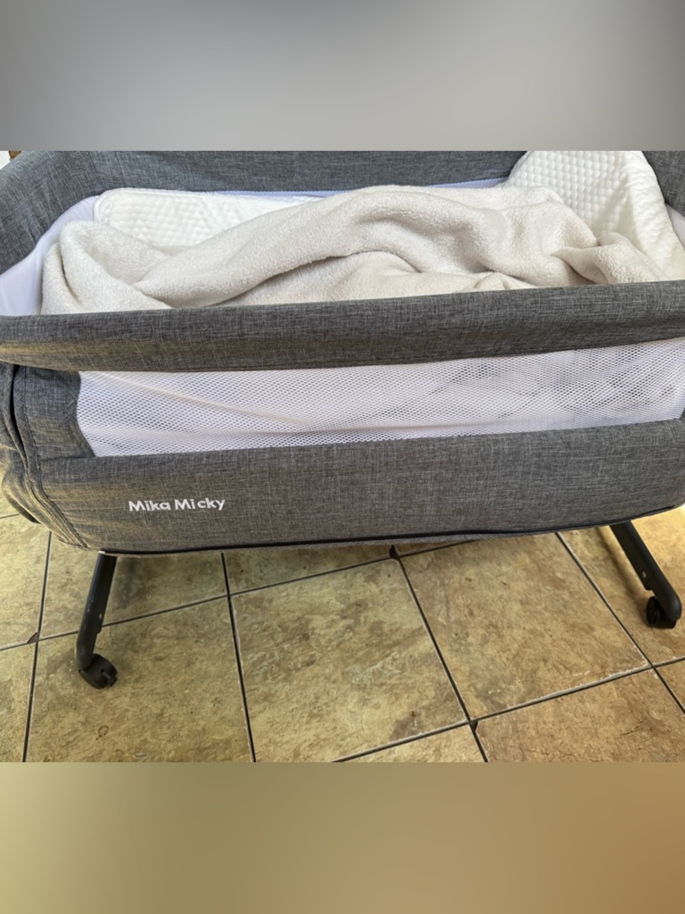 Gray Bassinet with Mesh Sides